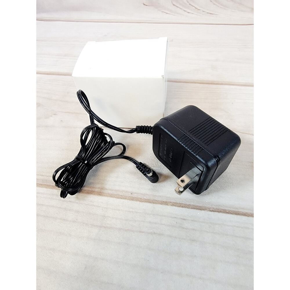 OEM AD-0970 AC Adapter 120VAC 60Hz 13W 9VDC 700mA Plug In Class 2 Transformer